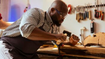 man-wears-safety-goggles-while-using-chisel-hammer-avoid-injury_482257-93661
